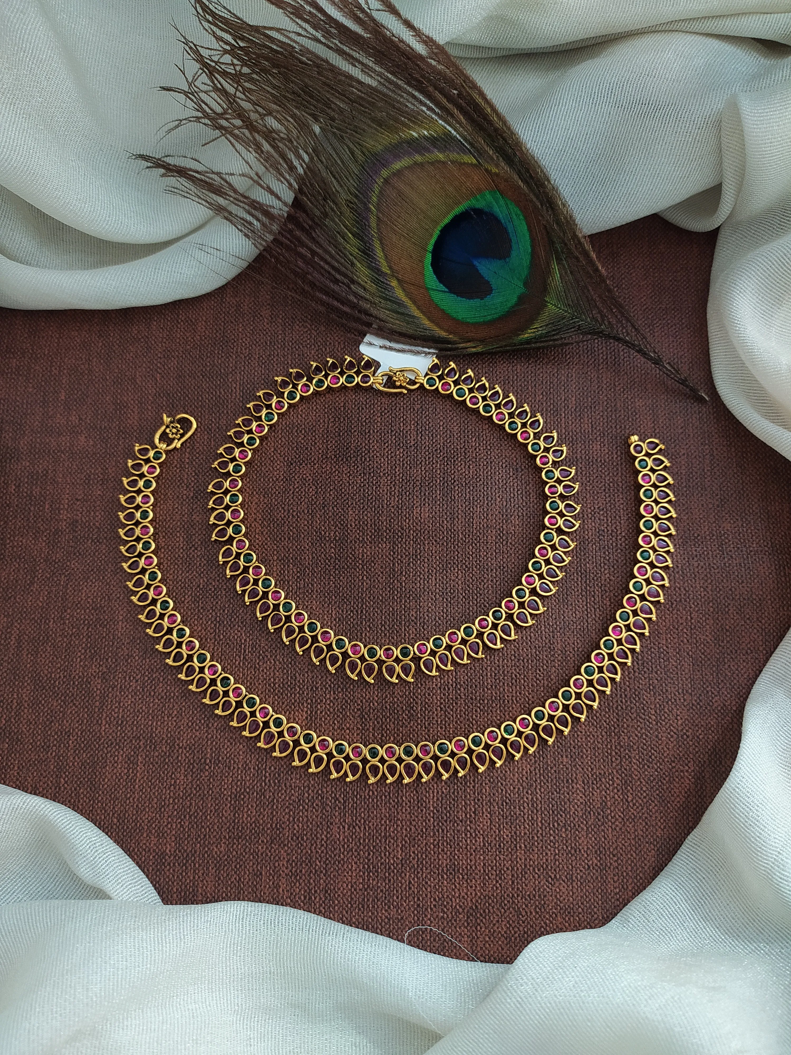 "Regal Charm: Antique Mango-Shaped Anklets with Kemp & Green Stones"